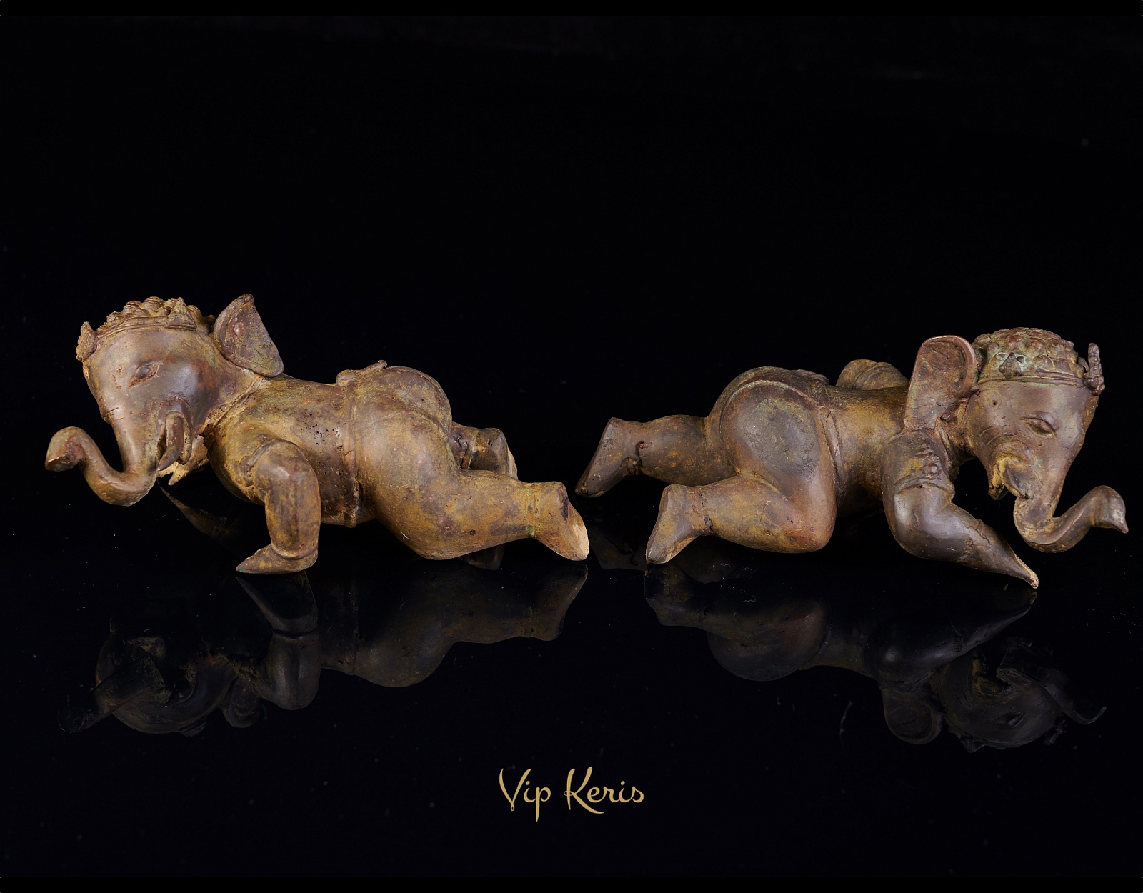 Две статуи малышей Ганеша фото VipKeris
